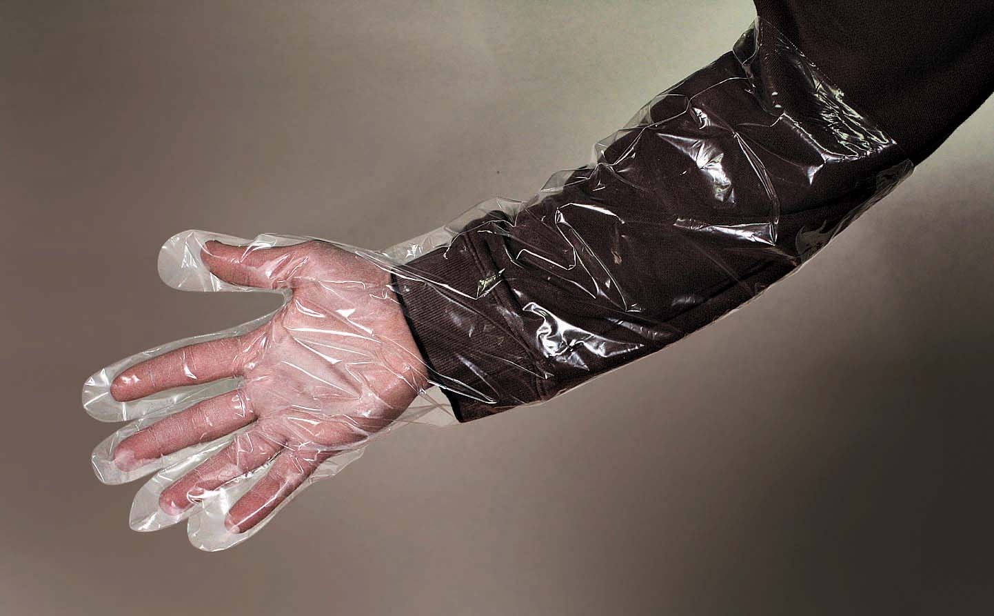 Cellucap Elbow Length Universal Size Clear Poly Glove - 100 per pack -- 5 packs per case.
