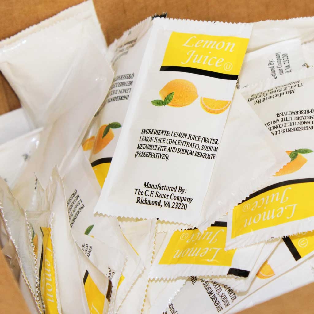 Commodity Dressing Lemon Juice, 4 Gram -- 200 per case.